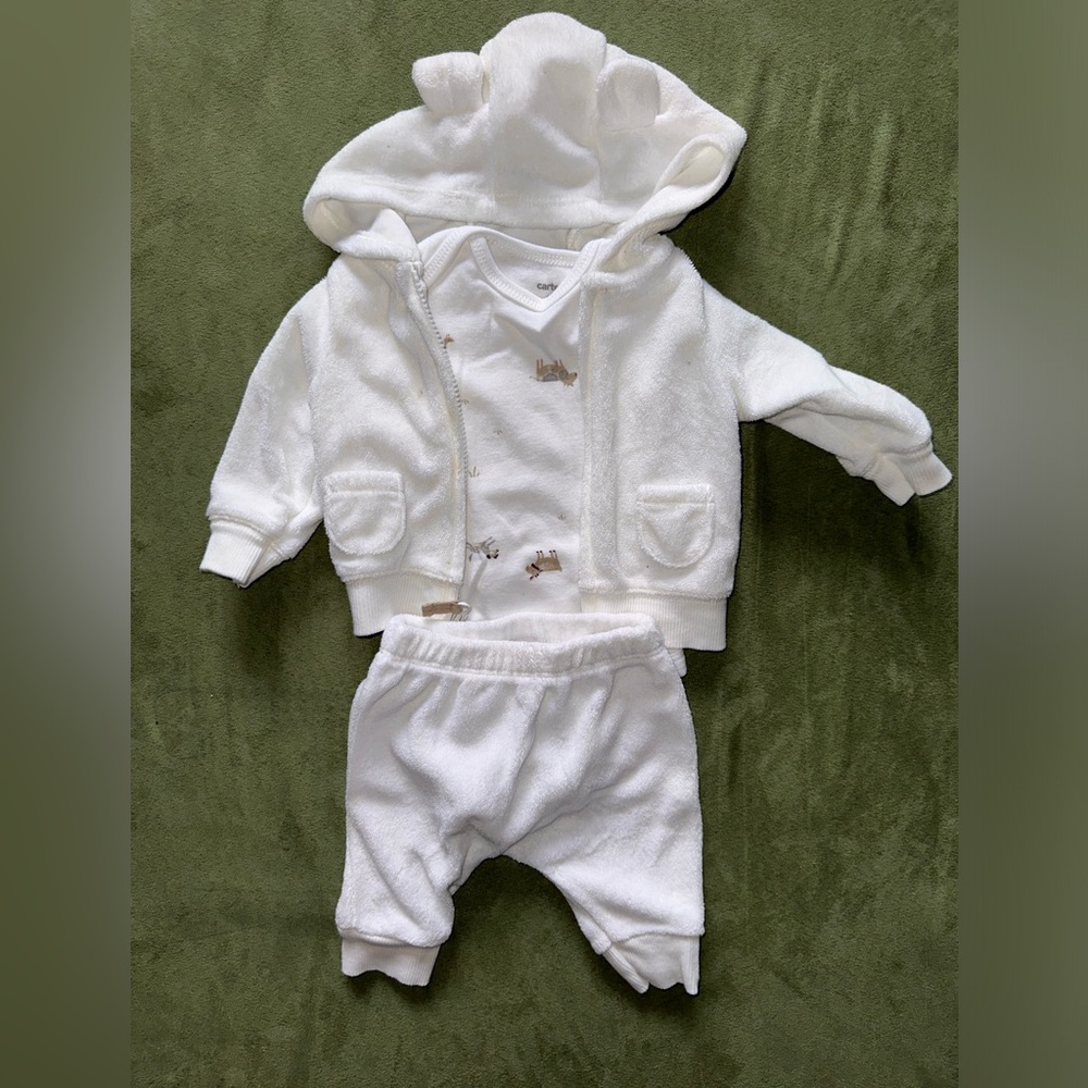 Carter’s White outfit with cow on pants and farm animals on inside r shirt.